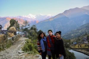 HCC Nepal Mumaya in Front of mountains with Friends