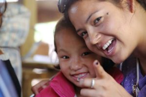 HCC Nepal Mumaya Pointing with Girl