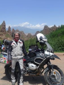 Ferrari Standing with Motorcycle